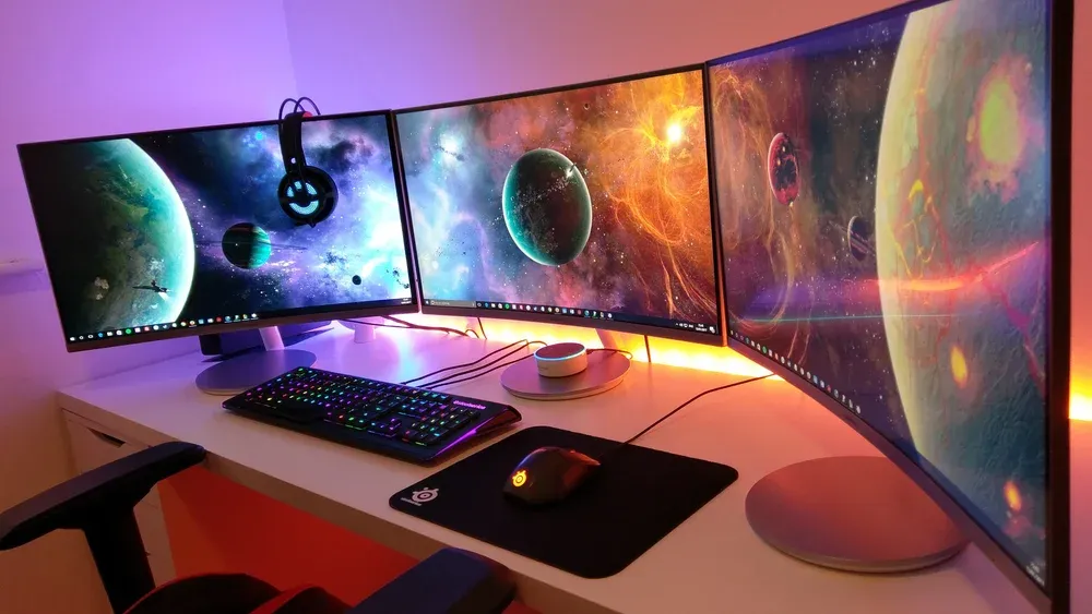A triple monitor PC gaming setup.