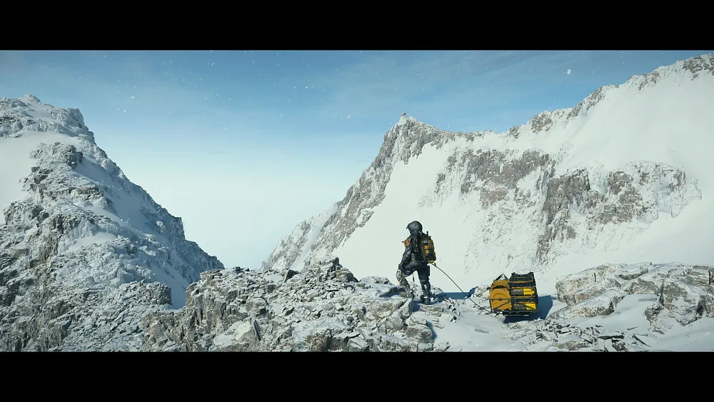 The main protagonist from Death Stranding 2 in a snowy mountain range.