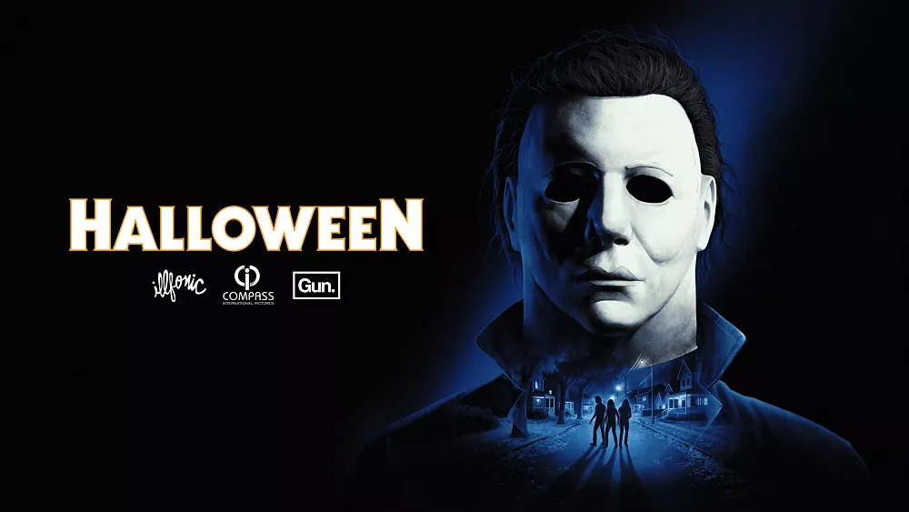 Title and logos for game studios. On the right is a closeup of horror villain Michael Myers.