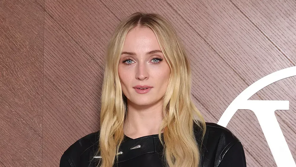 A headshot photograph of Sophie Turner.