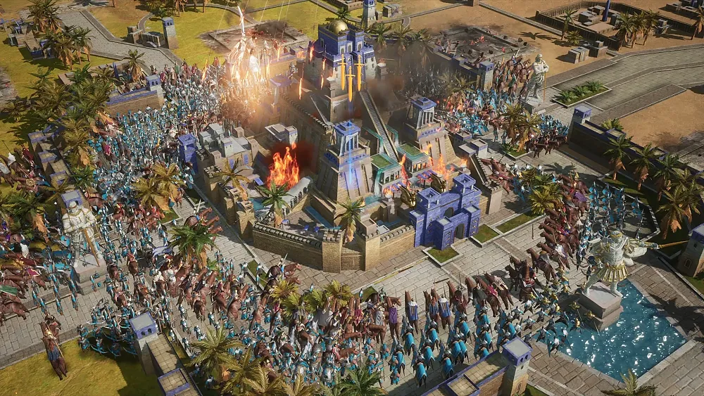 Screen showing a lot of troops, many on horseback, surrounding an enemy building.