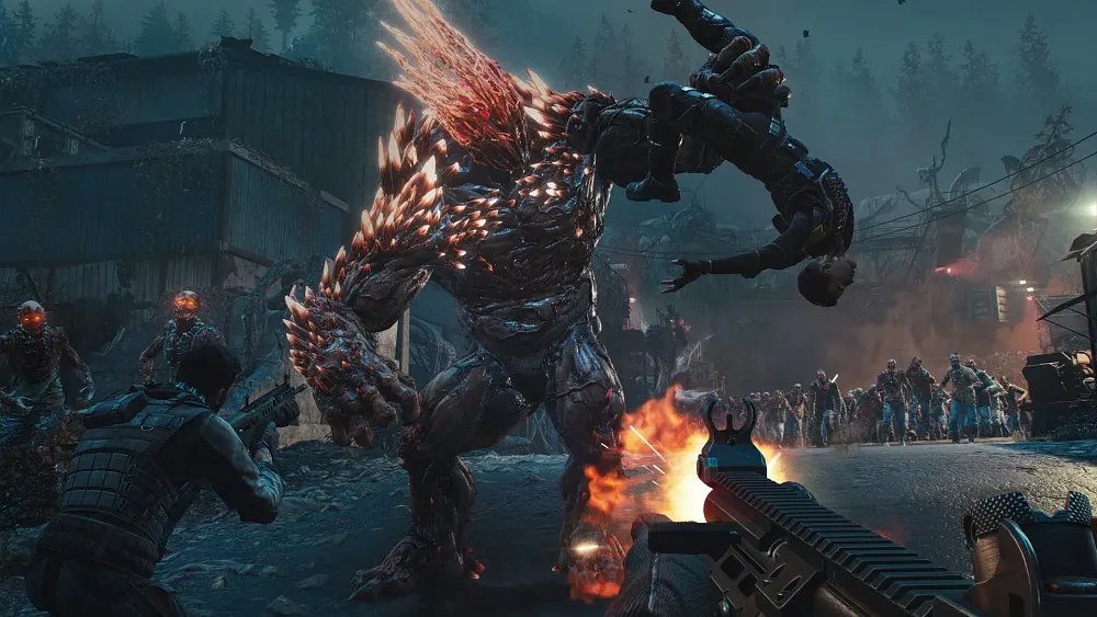 Screenshot from Toxic Commando showing a hulking mutated monstrosity attacking the player as a huge horde of zombies approaches in the back.