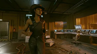 A woman in a cowboy hat running through a science facility.