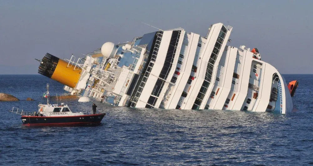 The Costa Concordia, a ship partially sunk on its side.