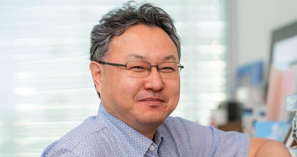 A photograph of an older man, Shuhei Yoshida.