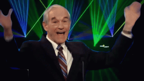 Excited man waving hands as "It's happening" flashes in text.