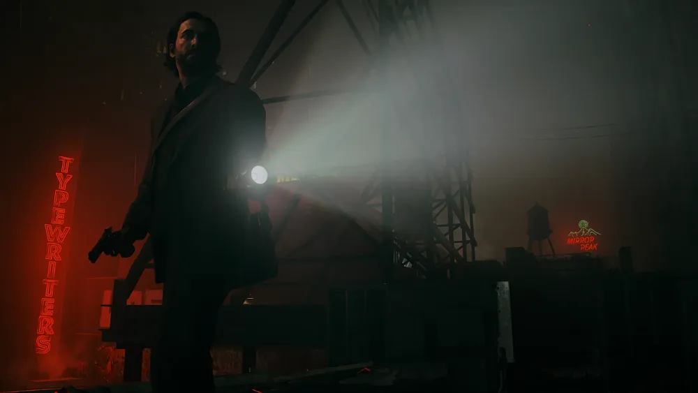 A man holding a gun and a flashlight standing in a dark, dreary city.