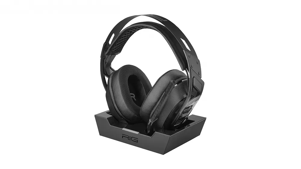 A gaming headset sitting in a base station.