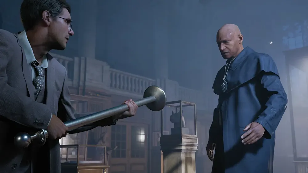 Indiana Jones holding up a pole to defend against a towering giant of a man staring him down.