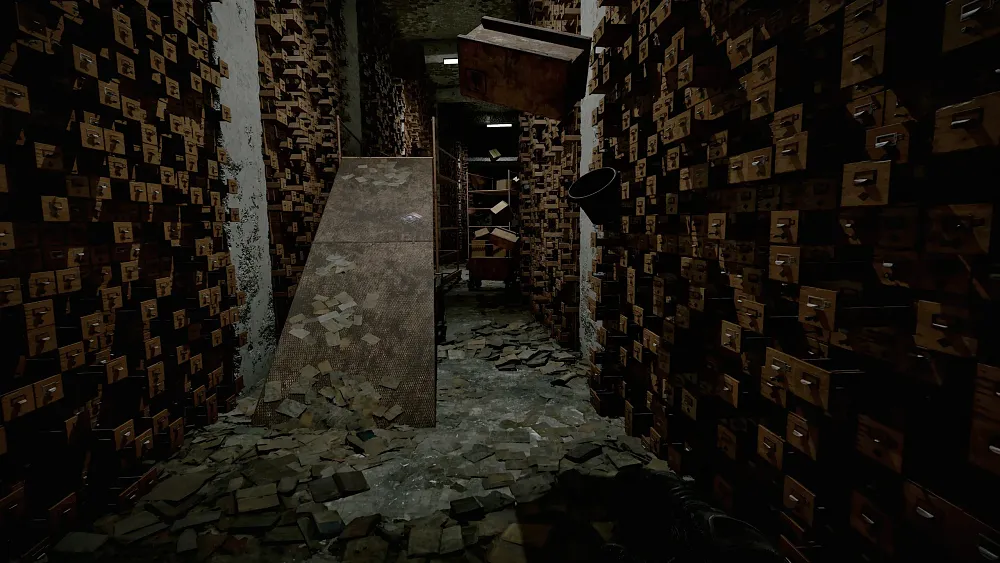 A screenshot from Stalker 2: Cost of Hope of a dimly lit hallway between towering rows of card catalog drawers.