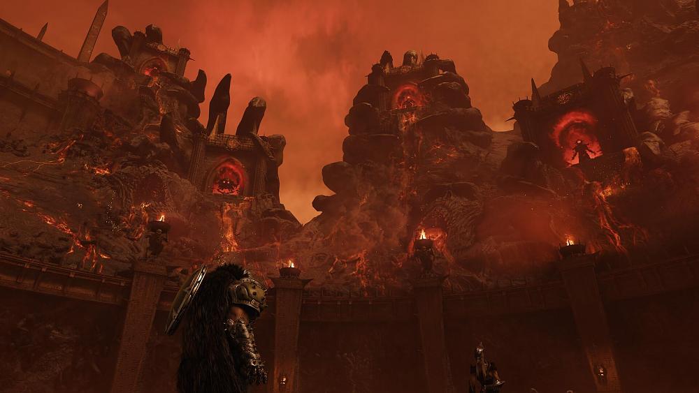 A brawny man with a fur cloak standing in a red, hellish realm staring up at a large structure or building.