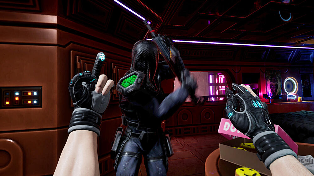 A screenshot from a VR version of the System Shock remake where the player character is giving a middle finger to an attacking enemy.