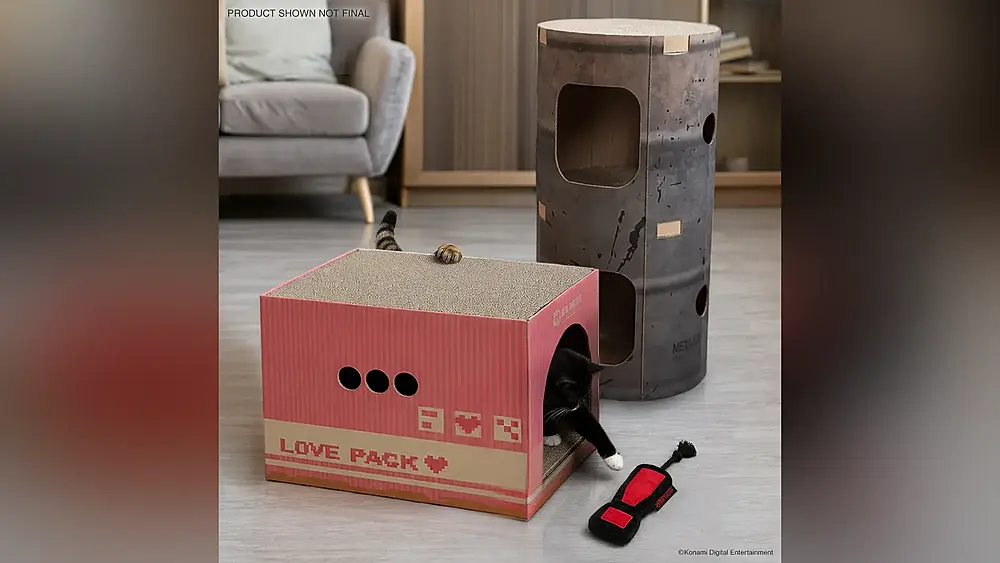 Cats playing around and in Metal Gear inspired cat toys and scratching boxes.