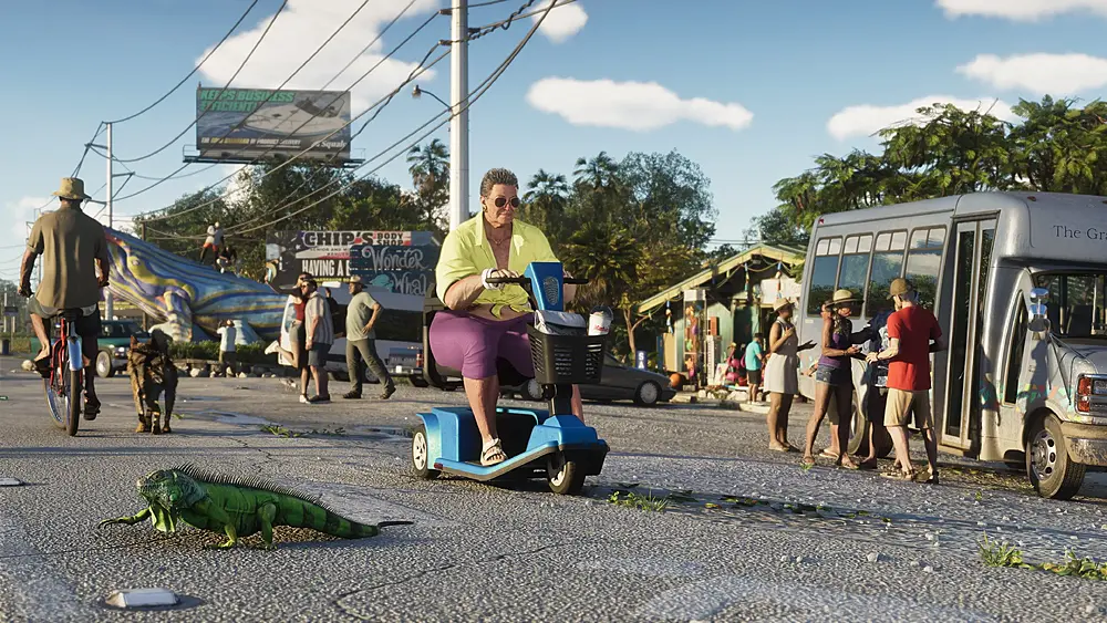 An old lady in a motorized scooter moving down a busy street with other pedestrians and a lizard on the road in a scene from the fake Florida in Grand Theft Auto 6.