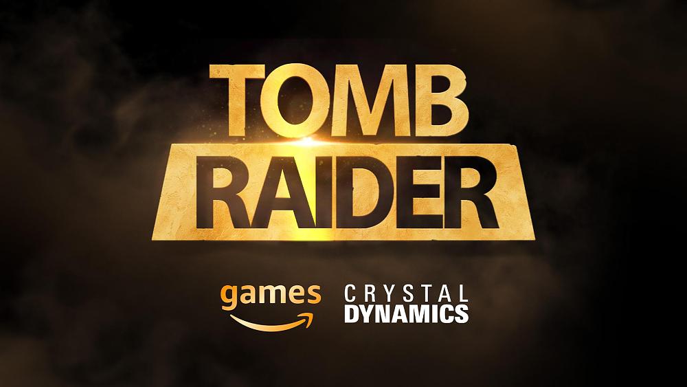 Text saying Tomb Raider in gold lettering with the logos for Amazon Games and Crystal Dynamics below