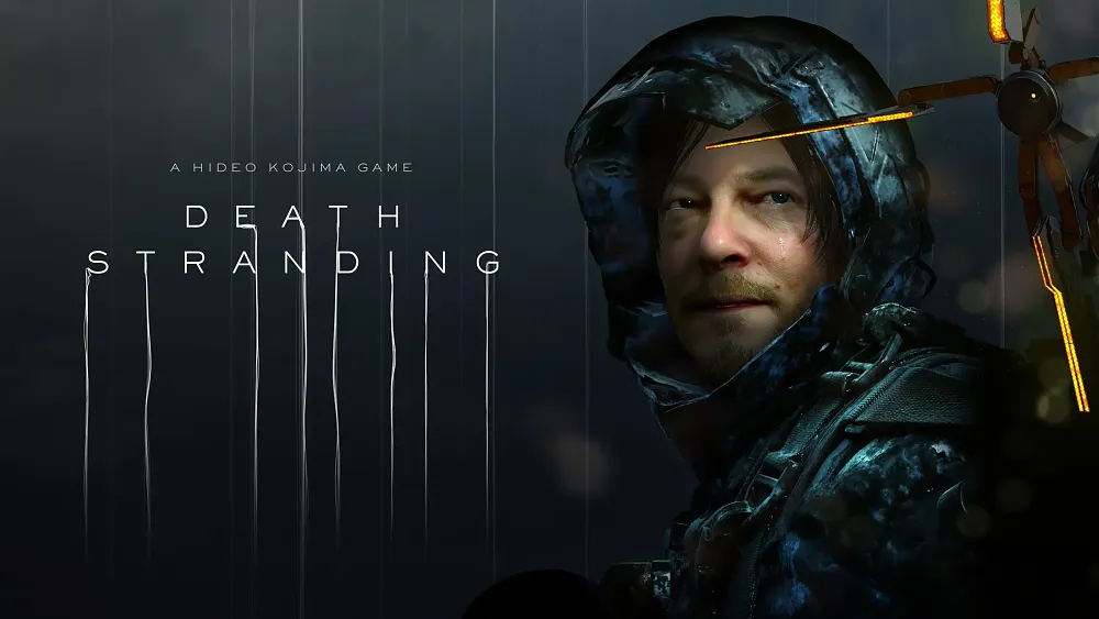 Man in hooded jacket standing in the rain looking off into the distance. The words "A Hideo Kojima Game" and "Death Stranding" appear on the left side of the image.