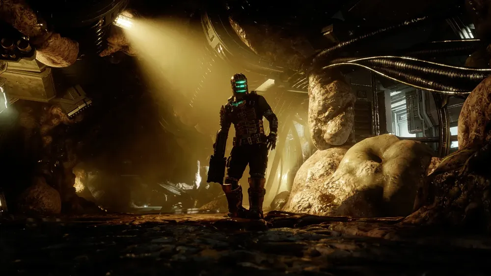A man standing in a hallway covered in organic material and bulbous masses. The man is holding a sci-fi style weapon and wearing a futuristic space suit covered in bits of metal from head to toe. His helmet has slots where a blue light is shining out from.
