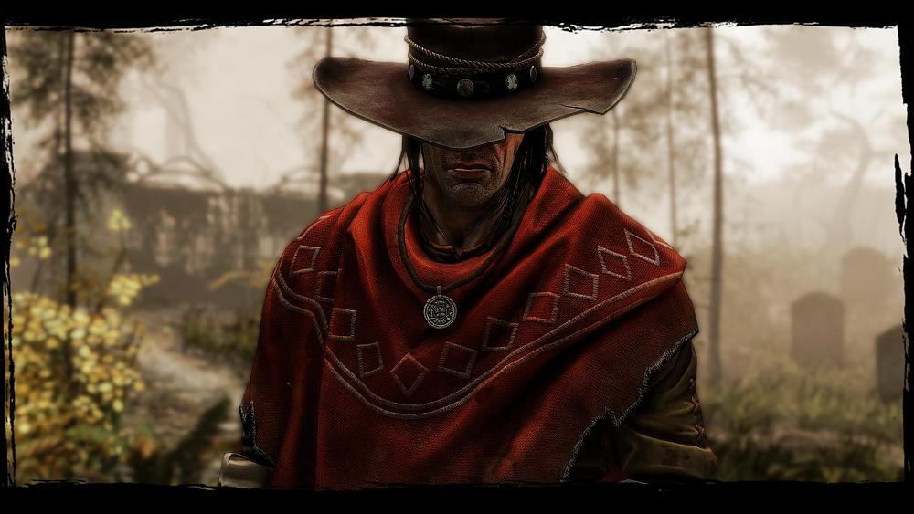 Screenshot showing a cowboy in a red poncho, eyes obscured by his wide cowboy hat.