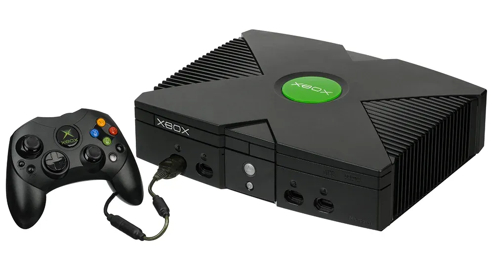 A photo of the original Xbox console with original controller.
