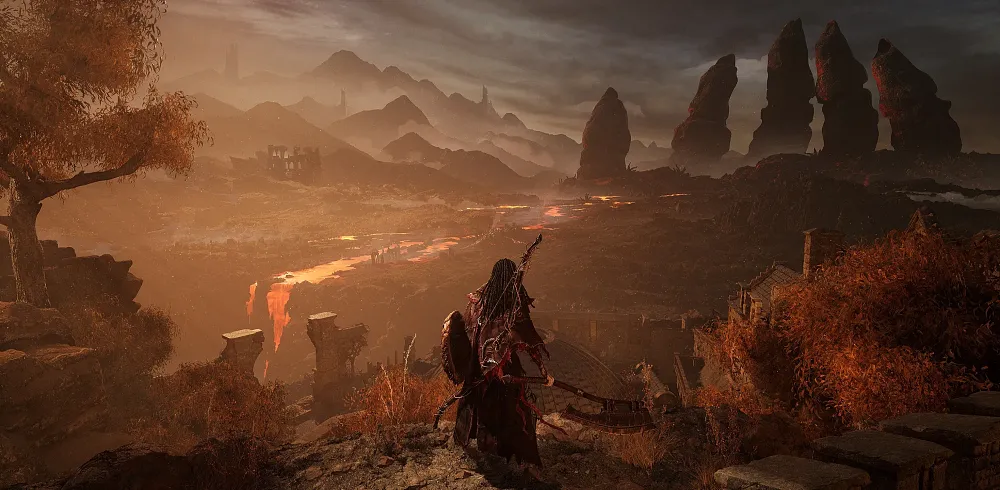 A character looks out over a vast wasteland environment.