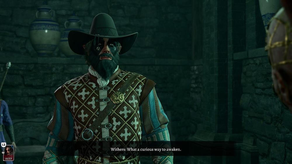 A large bearded bard with a cowboy hat and black facepaint.