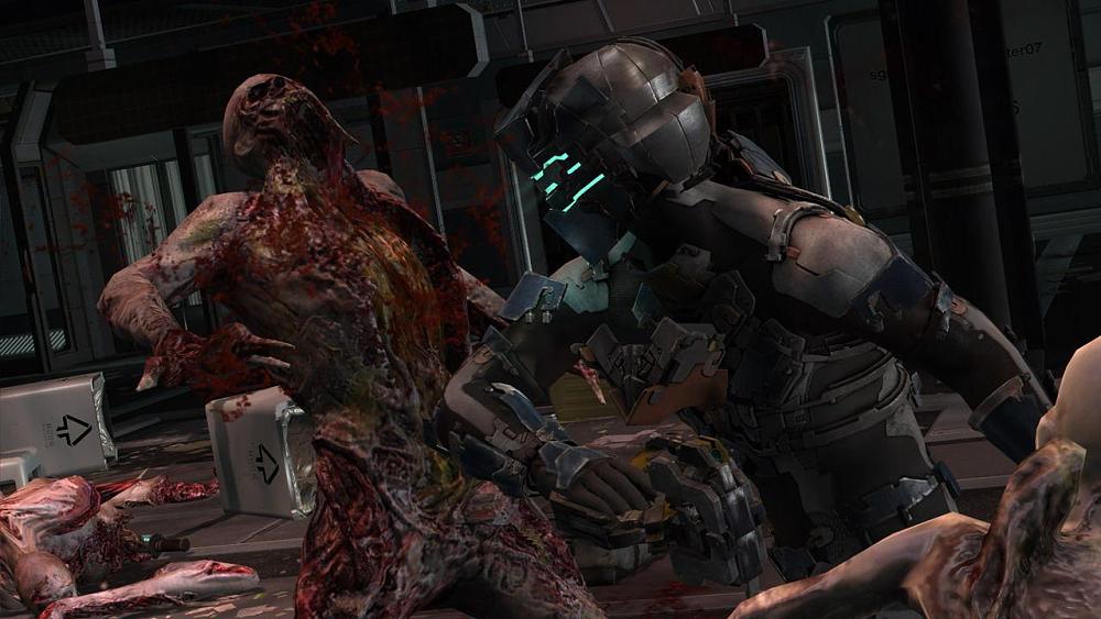 Person in armored suit punching a grotesque, bloody humanoid creature.