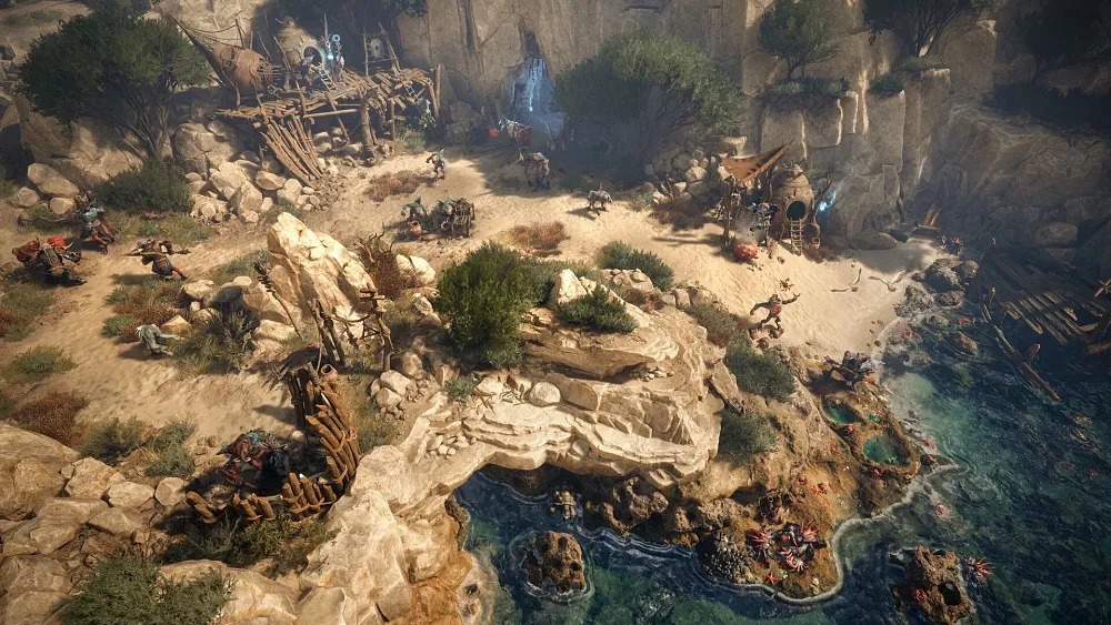 Screenshot showing a sandy desert area with a rocky cliffside near a sea.