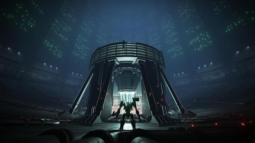 A mech standing inside a giant silo looking building.