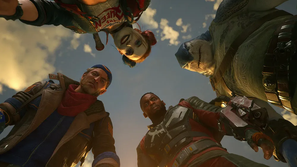 Four members of the Suicide Squad looking down at the camera.