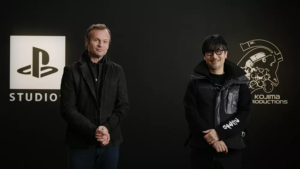 Sony's Hermen Hulst standing next to Hideo Kojima.