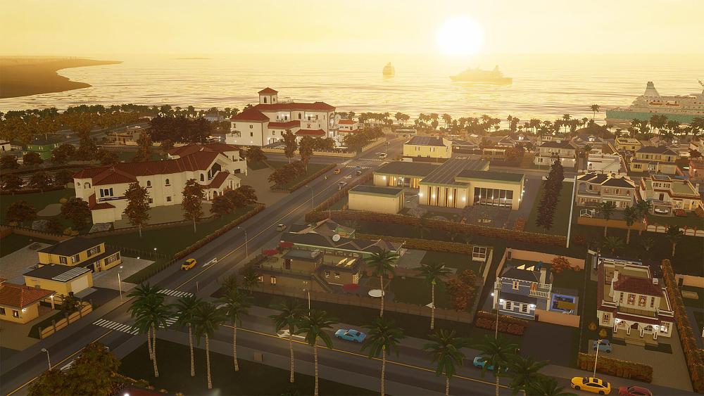 An image from the city building game, Cities: Skylines 2, showing several houses and a body of water with the sun setting in the background.