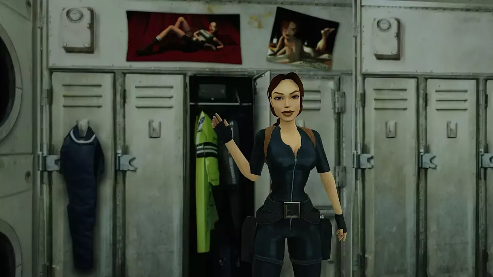 Lara Croft in Tomb Raider 3 standing next to two pinup posters of Lara Croft.